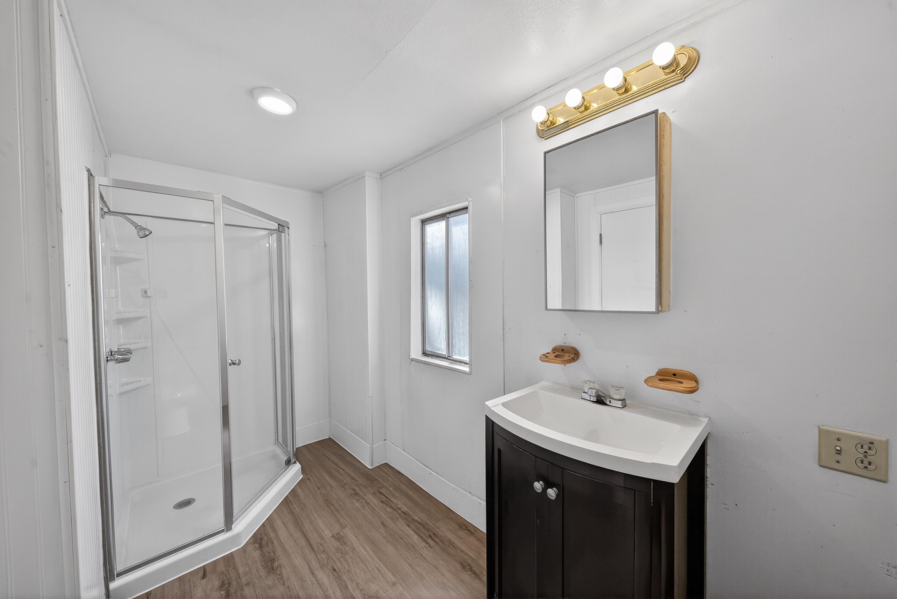 21133 Ronald Street Anderson, CA 96007 - Photo 20 of 26 a utility room with closet and mirror