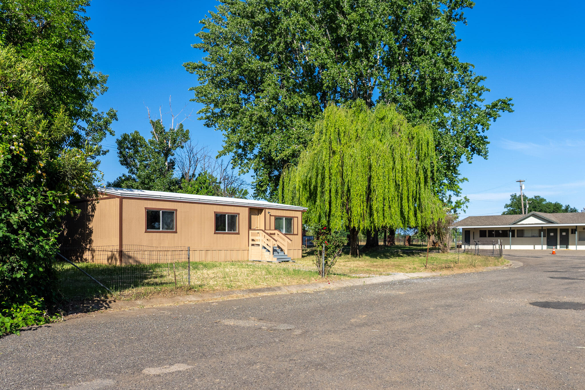 21133 Ronald Street Anderson, CA 96007 - Photo 2 of 26 front view of house with a yard
