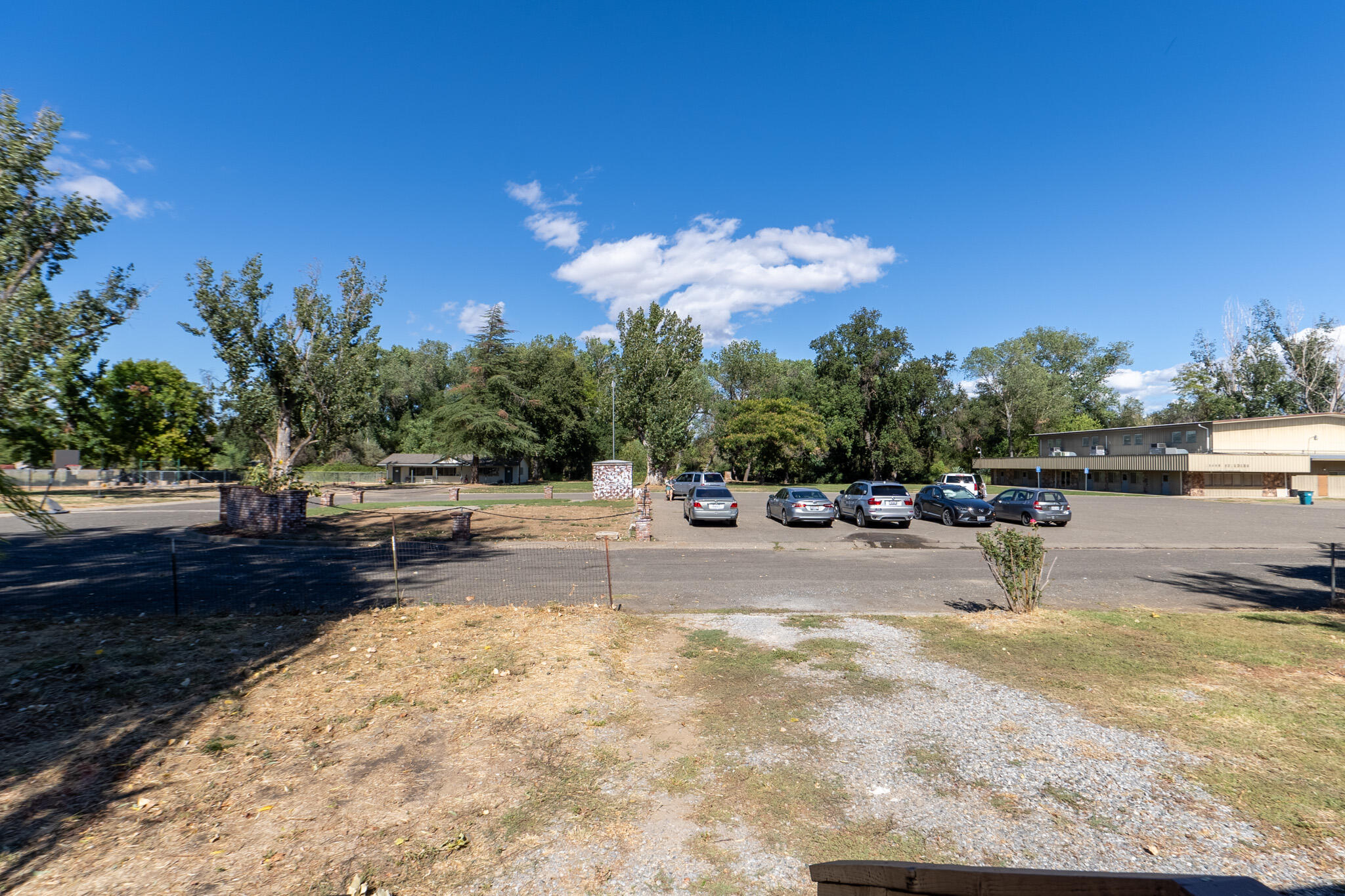 21133 Ronald Street Anderson, CA 96007 - Photo 26 of 26 a view of a swimming pool with an outdoor seating and a yard