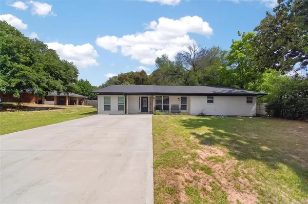 a view of house with outdoor space