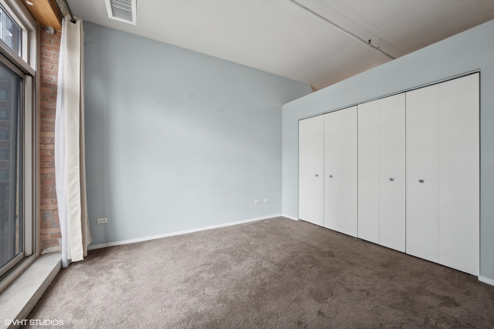 420 South Clinton Street, Unit 317A Chicago, IL 60607 - Photo 12 of 17 a view of an empty room