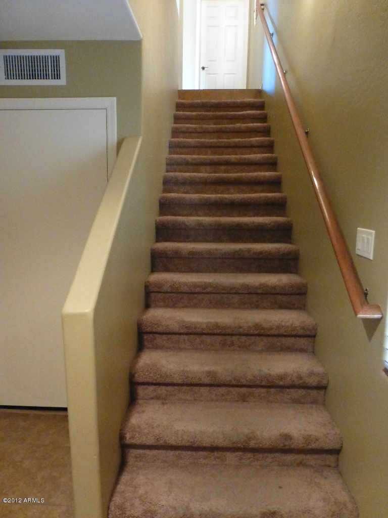 9551 East Redfield Road, Unit 1026 Scottsdale, AZ 85260 - Photo 33 of 40 Stair well leading to 2nd Level