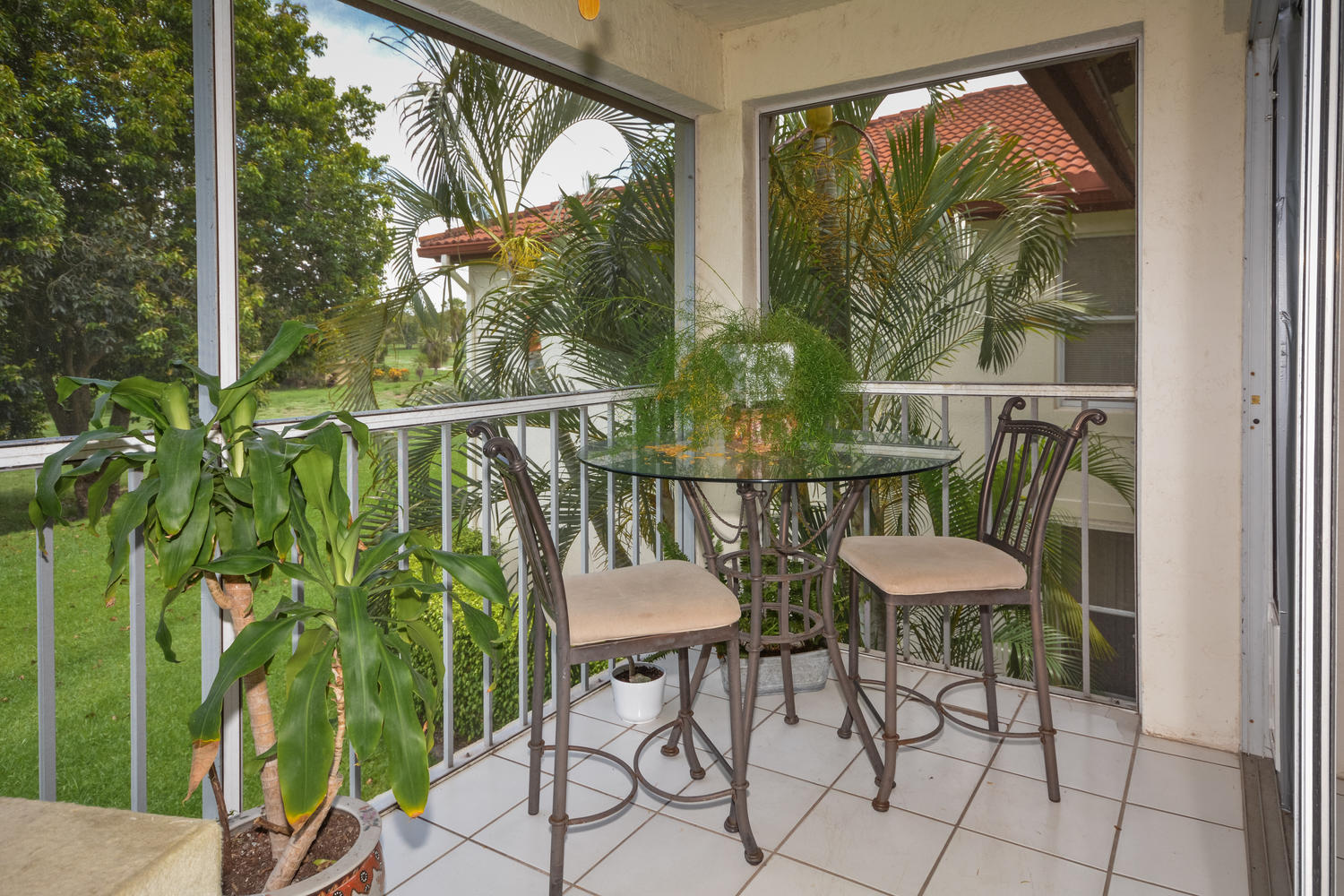 360 Northwest 67th Street, Unit E202 Boca Raton, FL 33487 - Photo 5 of 20 Screened Balcony