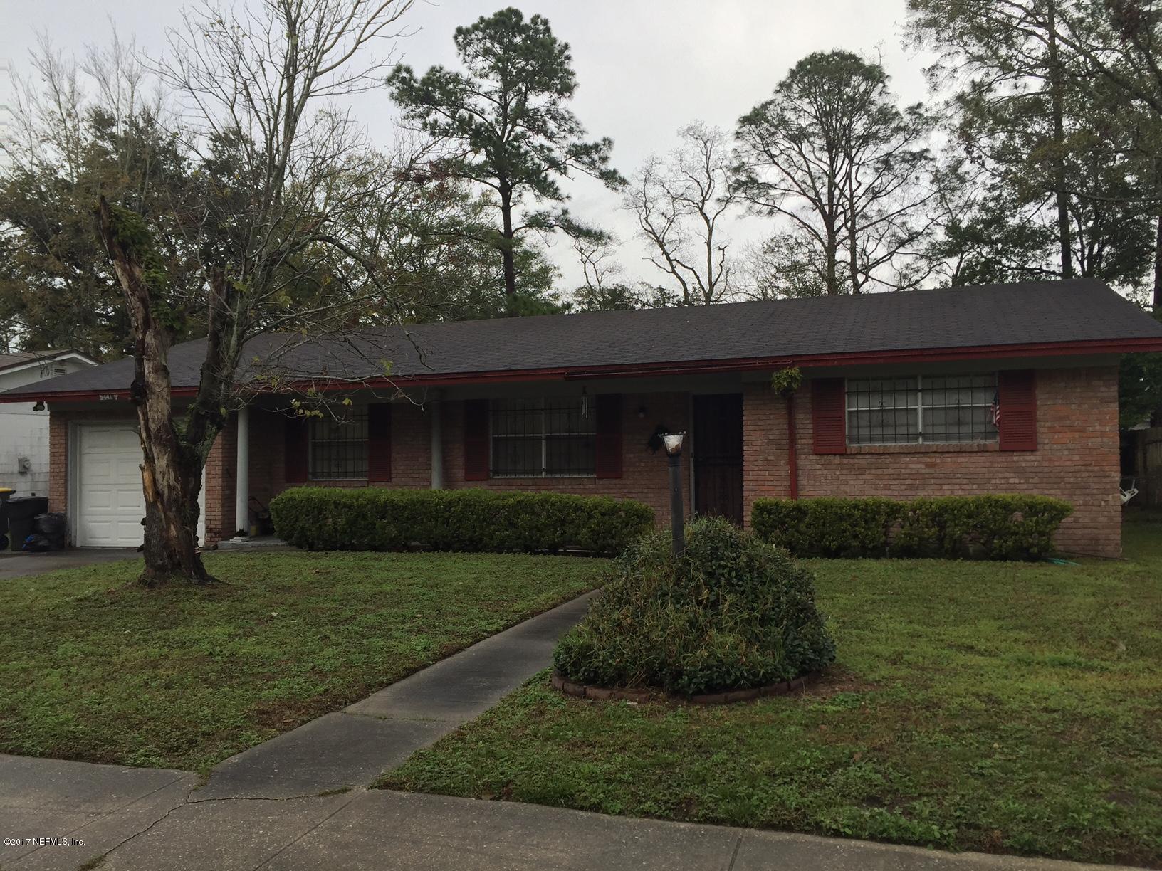 5441 Kennerly Road Jacksonville, FL 32207 - Photo 1 of 1 a front view of a house with a yard