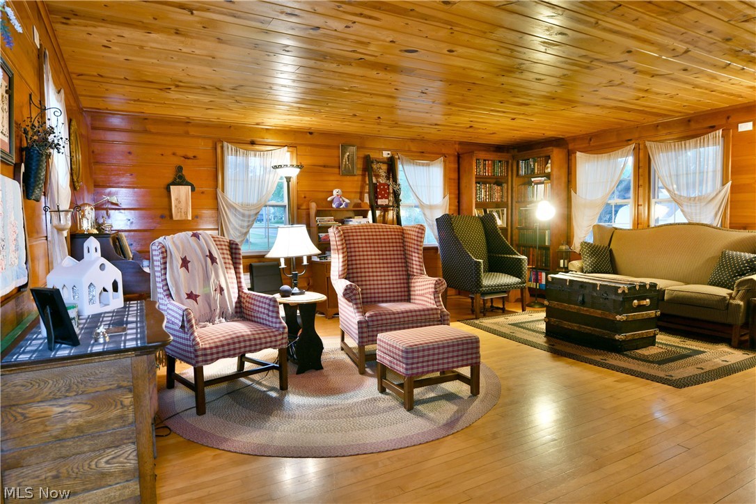 8683 King Graves Road Northeast Warren, OH 44484 - Photo 16 of 50 Warm wood-paneled walls and ceiling