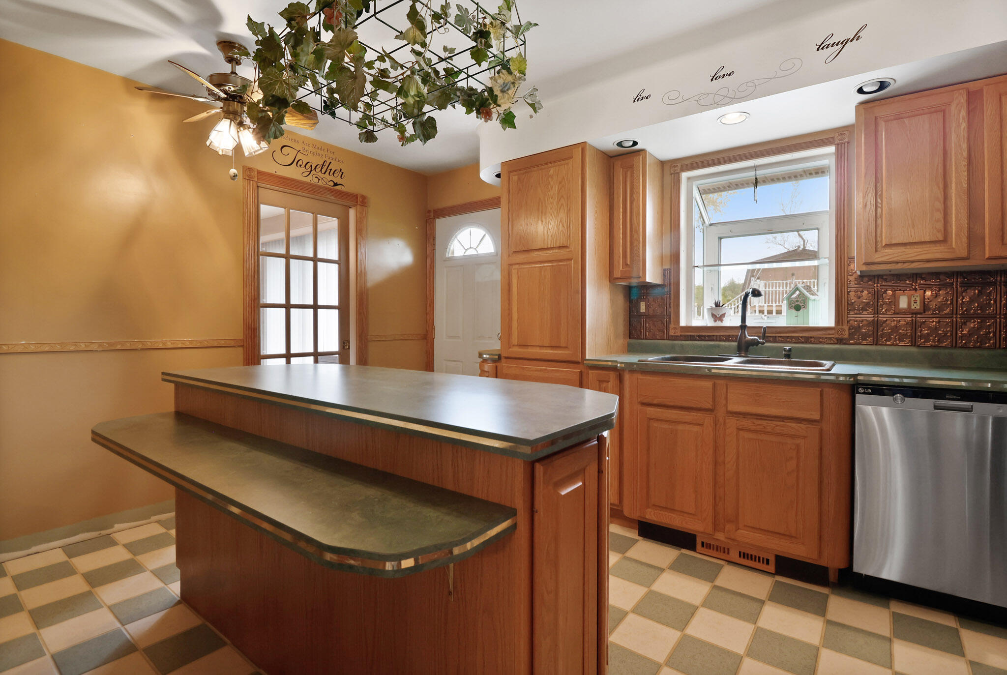 279 Robbie Lane Valparaiso, IN 46385 - Photo 12 of 35 a kitchen with stainless steel appliances granite countertop a sink a stove and a microwave