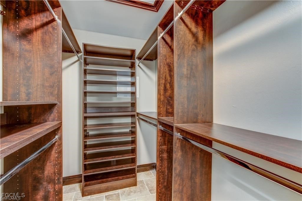 20051-071 Welborn Road North Fort Myers, FL 33917 - Photo 17 of 35 a view of walk in closet