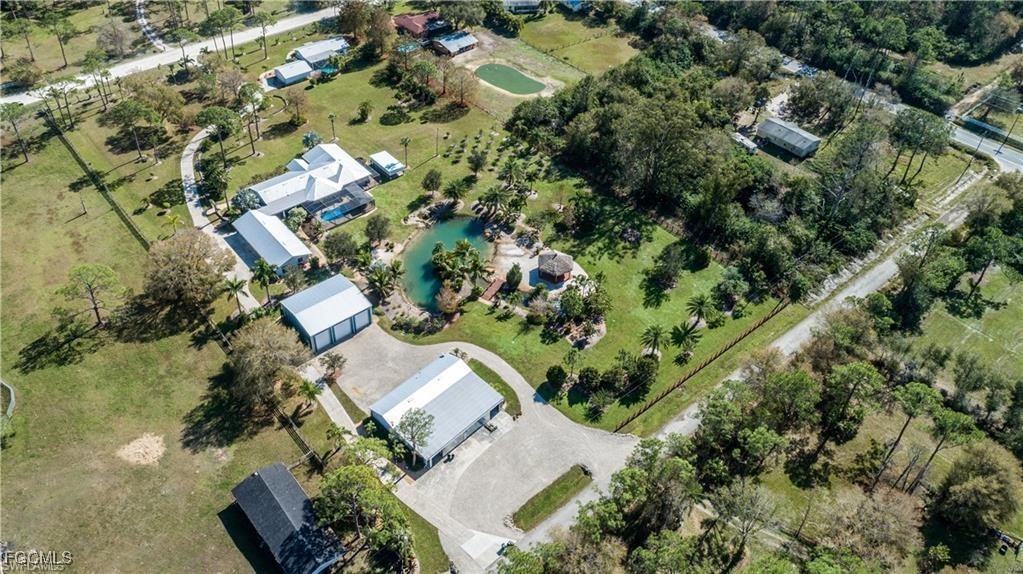 20051-071 Welborn Road North Fort Myers, FL 33917 - Photo 35 of 35 an aerial view of a residential houses with outdoor space and street view