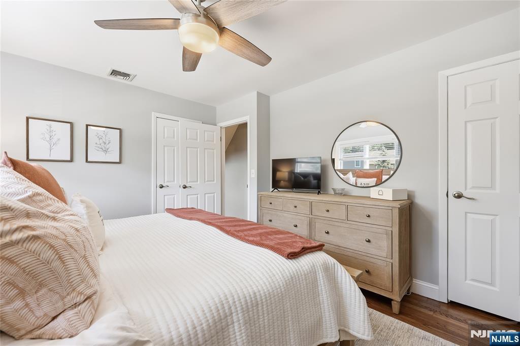77 White Pond Road Waldwick, NJ 07463 - Photo 15 of 33 a bedroom with a bed and a dresser