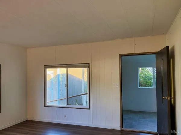 wooden floor and window in a room