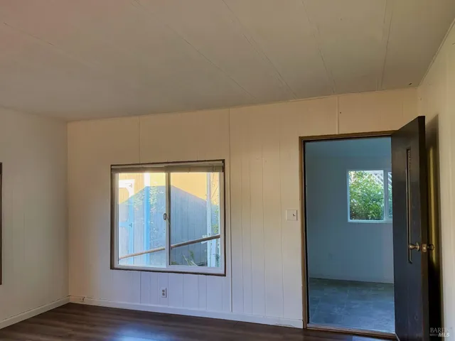 wooden floor and window in a room