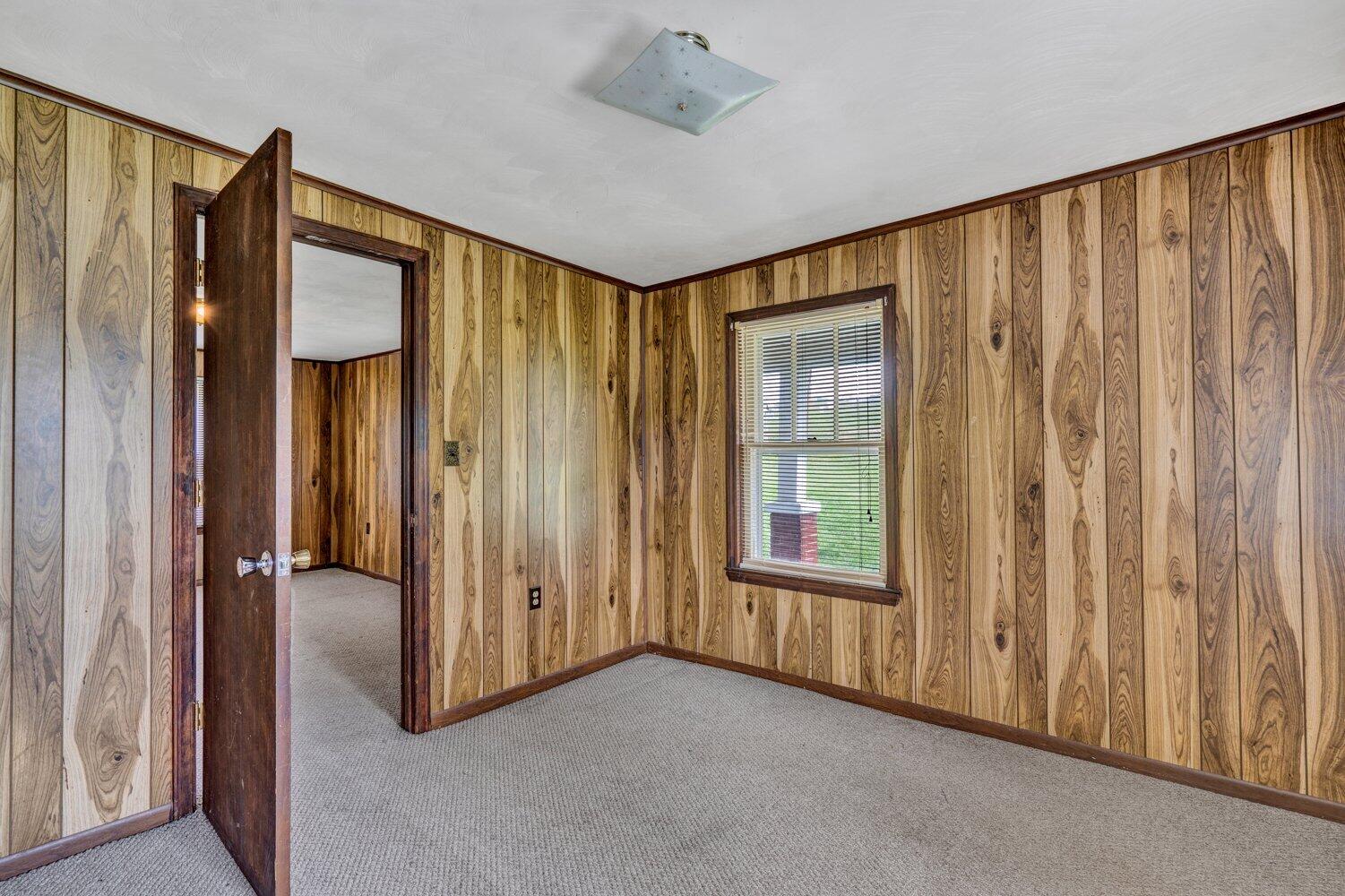 3191 Webster Road Blue Ridge, VA 24064 - Photo 6 of 18 a view of a hallway with entryway door