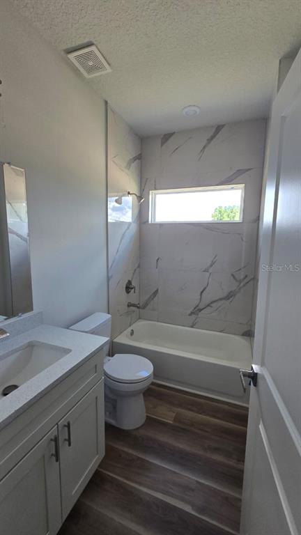 Undisclosed Address Orlando, FL 32805 - Photo 4 of 16 a bathroom with a sink a toilet and shower