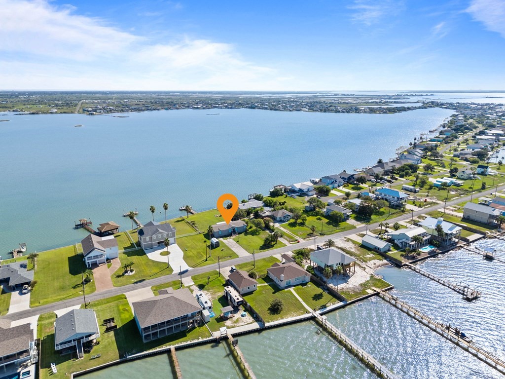 159 Copano Ridge Road Rockport, TX 78382 - Photo 4 of 31 a terrace with outdoor seating and city view