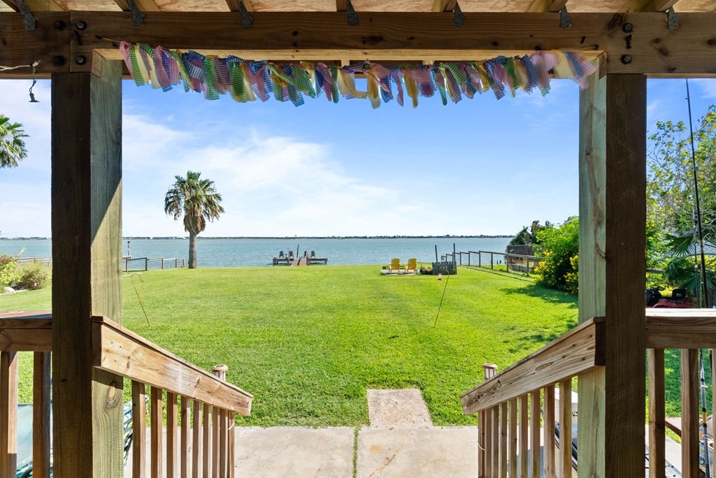 159 Copano Ridge Road Rockport, TX 78382 - Photo 8 of 31 a view of a backyard with a lake view