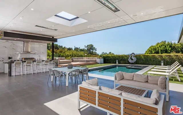 a outdoor living space with furniture and outdoor view