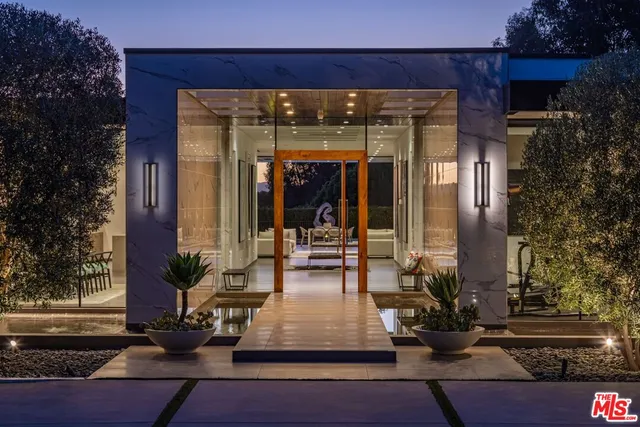 a view of potted plants in front of building