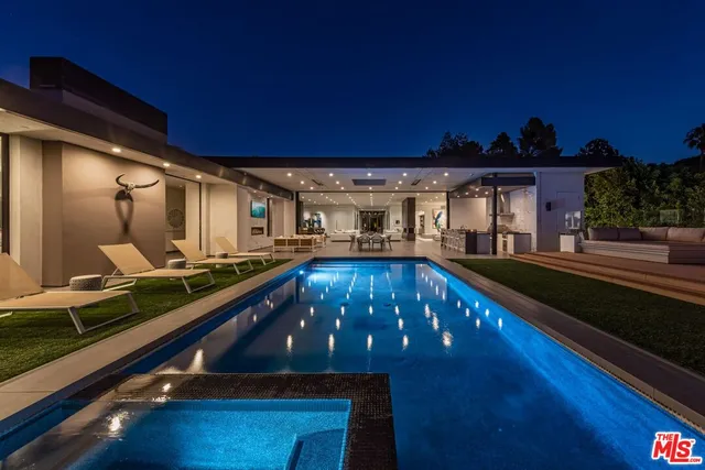 a view of a chairs and table on the wooden floor