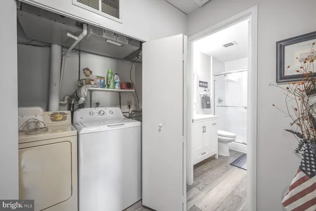 a storage room with washer and dryer