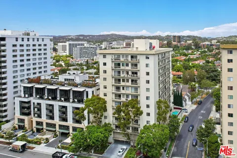 a view of a city with tall buildings