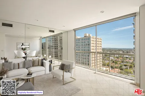 a living room with furniture and a floor to ceiling window