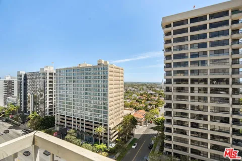 a view of a city with tall buildings