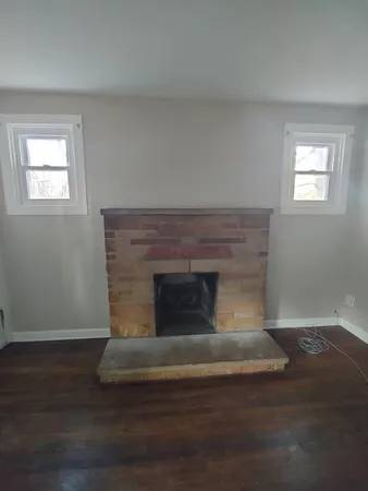 a living room with a fireplace