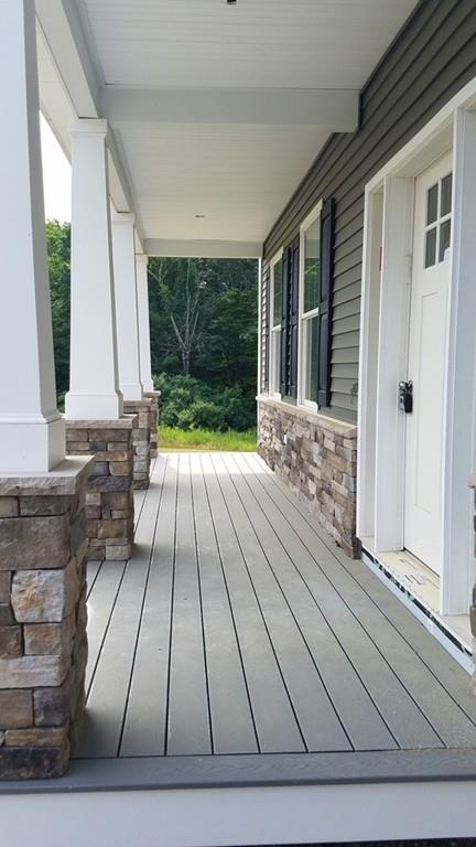 120 Pulpit Road Bedford, NH 03110 - Photo 11 of 40 a view of backyard with a garden and entryway