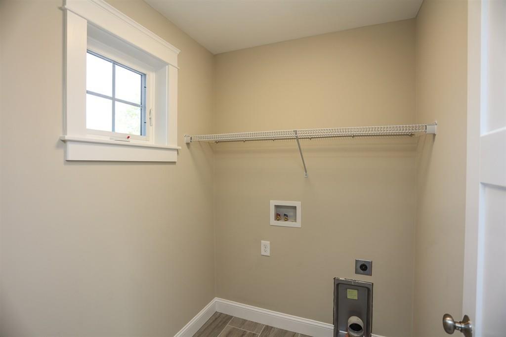 120 Pulpit Road Bedford, NH 03110 - Photo 32 of 40 a bathroom with a window