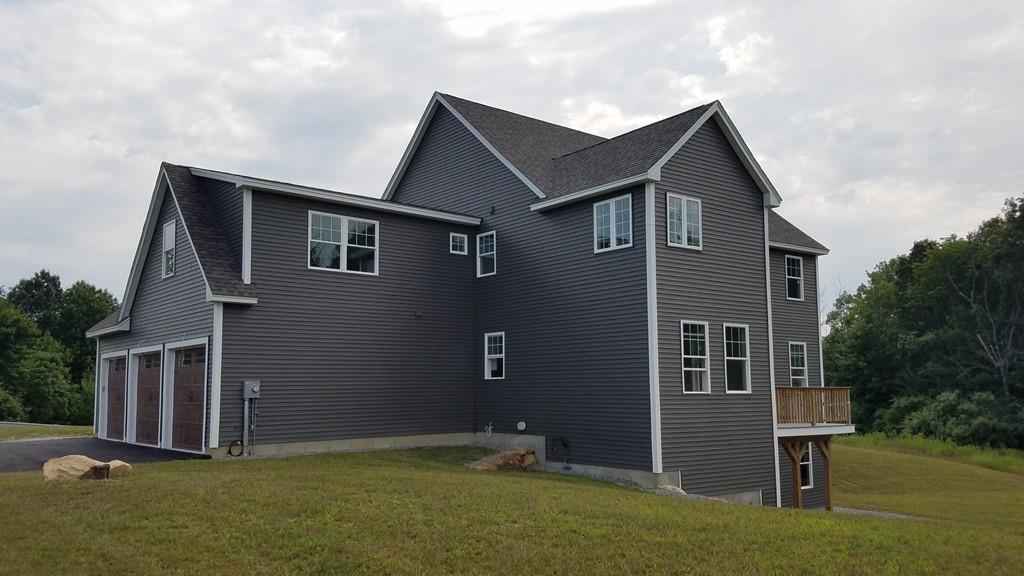120 Pulpit Road Bedford, NH 03110 - Photo 4 of 40 front view of house with a yard