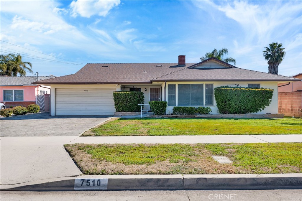 7510 Capps Avenue Reseda, CA 91335 - Photo 1 of 1 a front view of a house with a yard