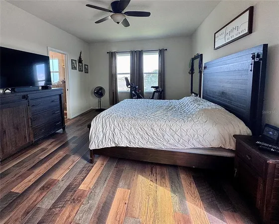 a bathroom with a tub a sink and a shower