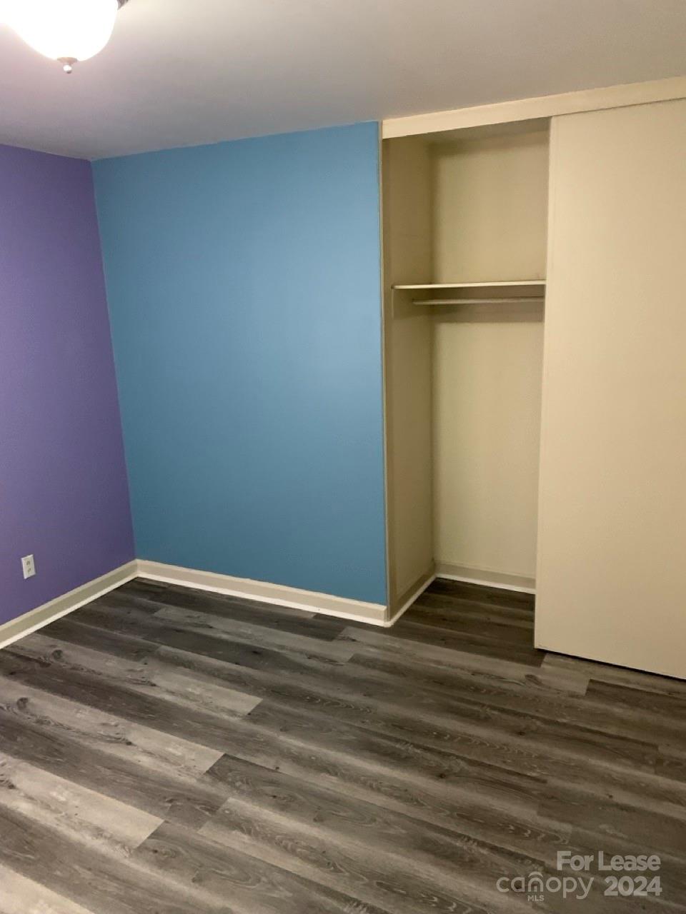 44177 B Mountain View Church Road Albemarle, NC 28001 - Photo 16 of 26 a view of an empty room with wooden floor