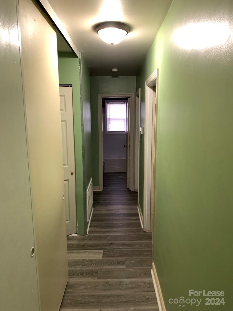 44177 B Mountain View Church Road Albemarle, NC 28001 - Photo 10 of 26 a view of a hallway with wooden floor