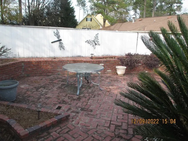 a view of a backyard of a house