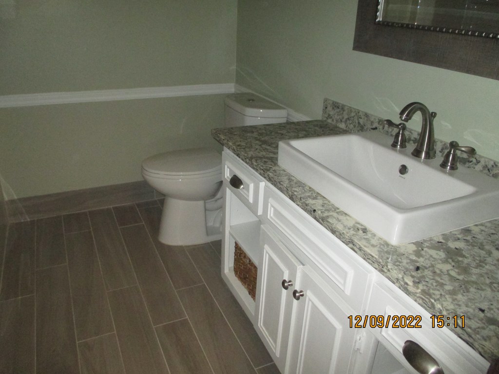 7201 West Wynfield Loop Midland, GA 31820 - Photo 25 of 34 a bathroom with a sink and toilet