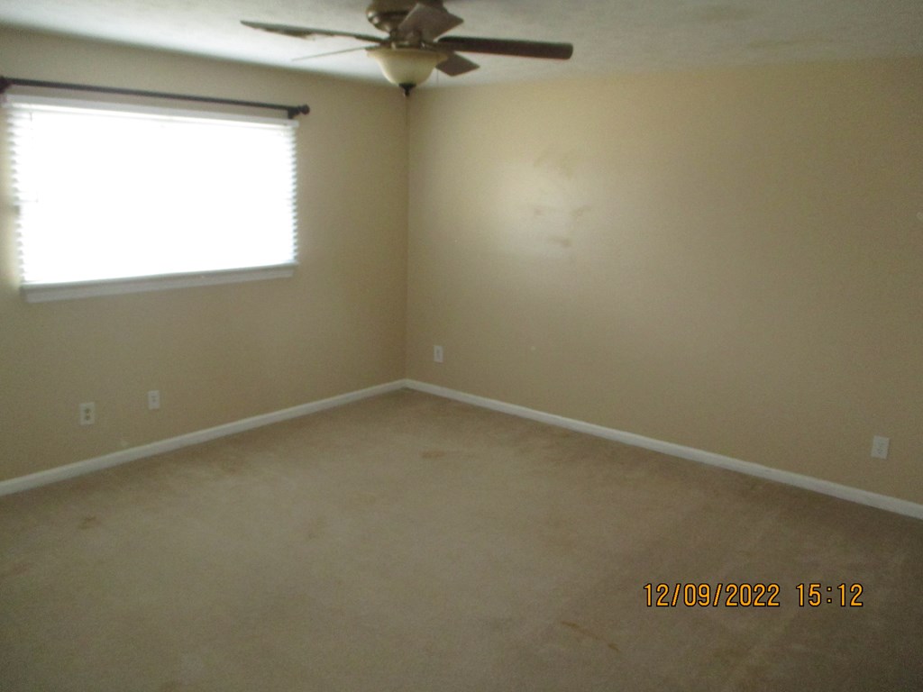 7201 West Wynfield Loop Midland, GA 31820 - Photo 27 of 34 an empty room with a window