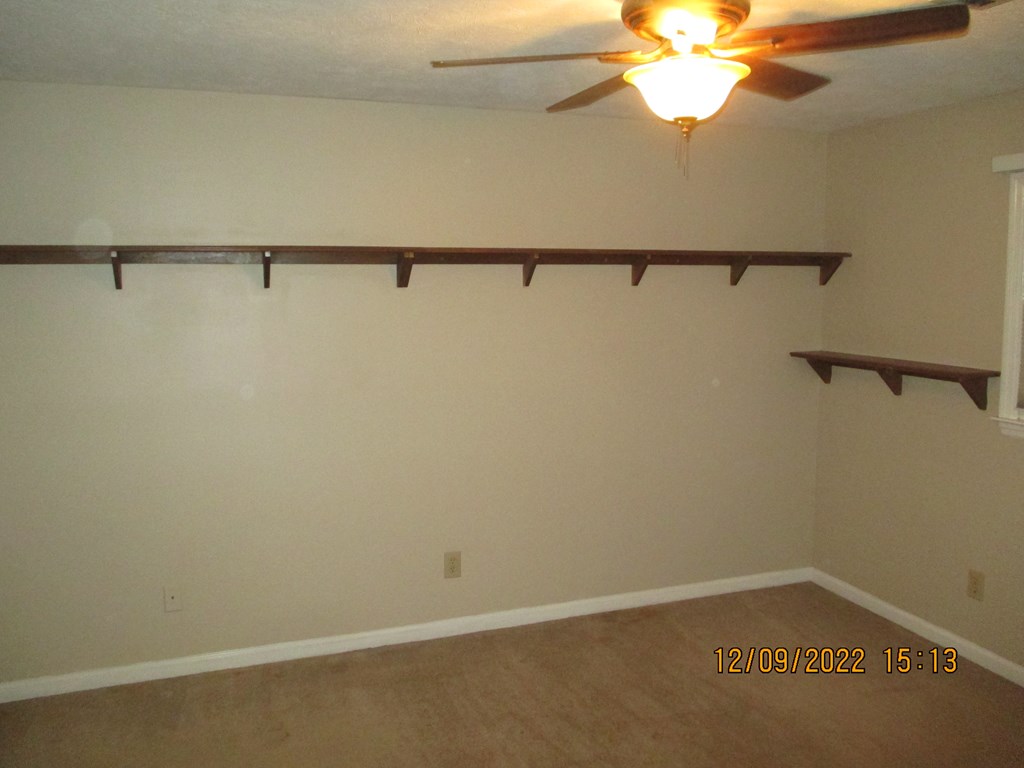 7201 West Wynfield Loop Midland, GA 31820 - Photo 29 of 34 a view of a room with racks on the wall