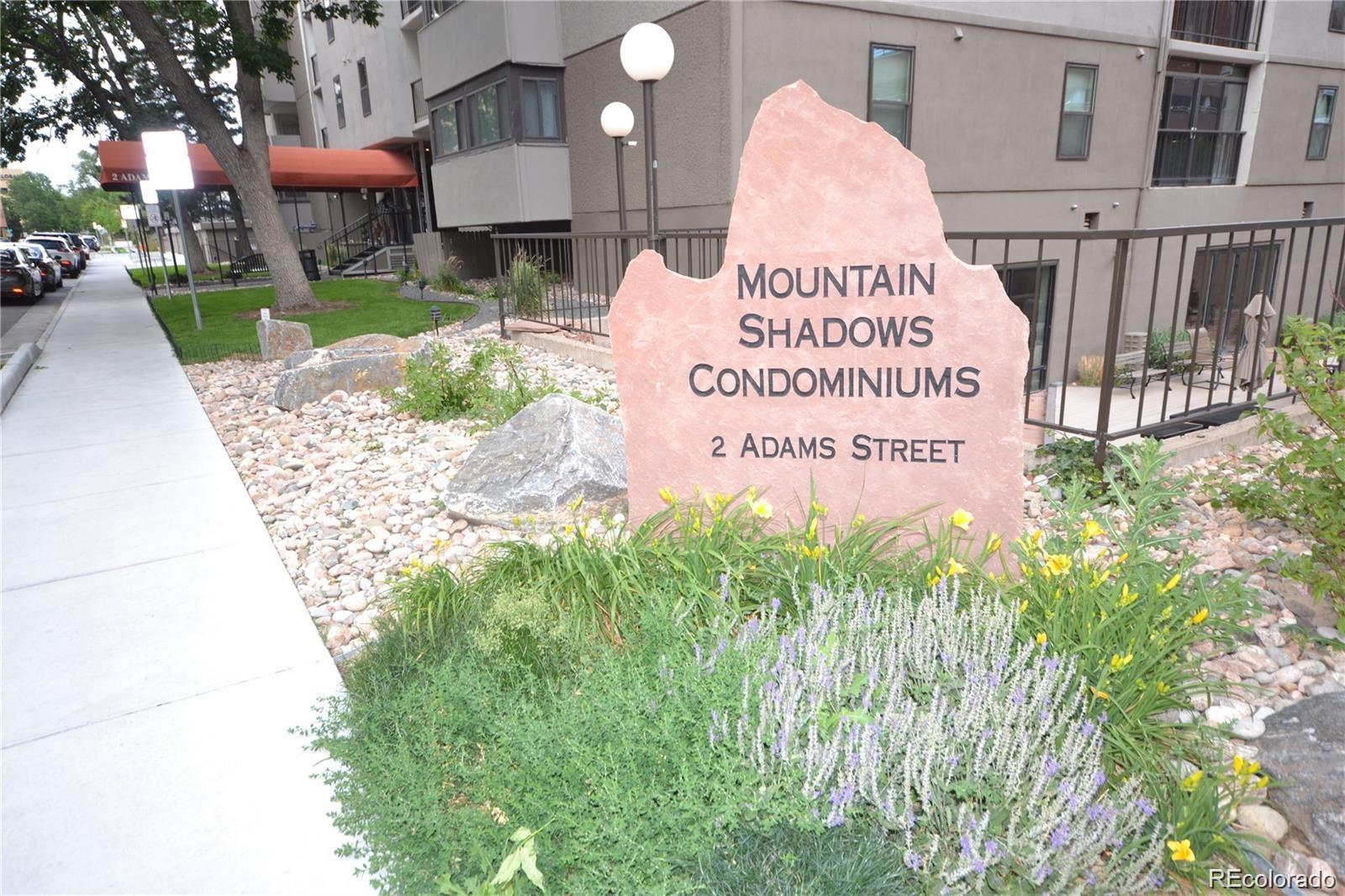 2 Adams Street, Unit 604 Denver, CO 80206 - Photo 2 of 41 a sign on the side of a building