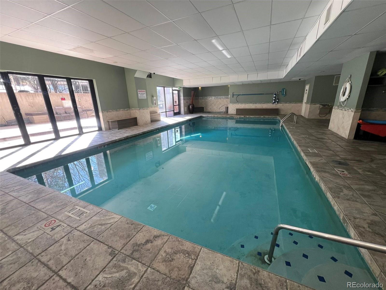 2 Adams Street, Unit 604 Denver, CO 80206 - Photo 25 of 41 a view of a living room and bathroom