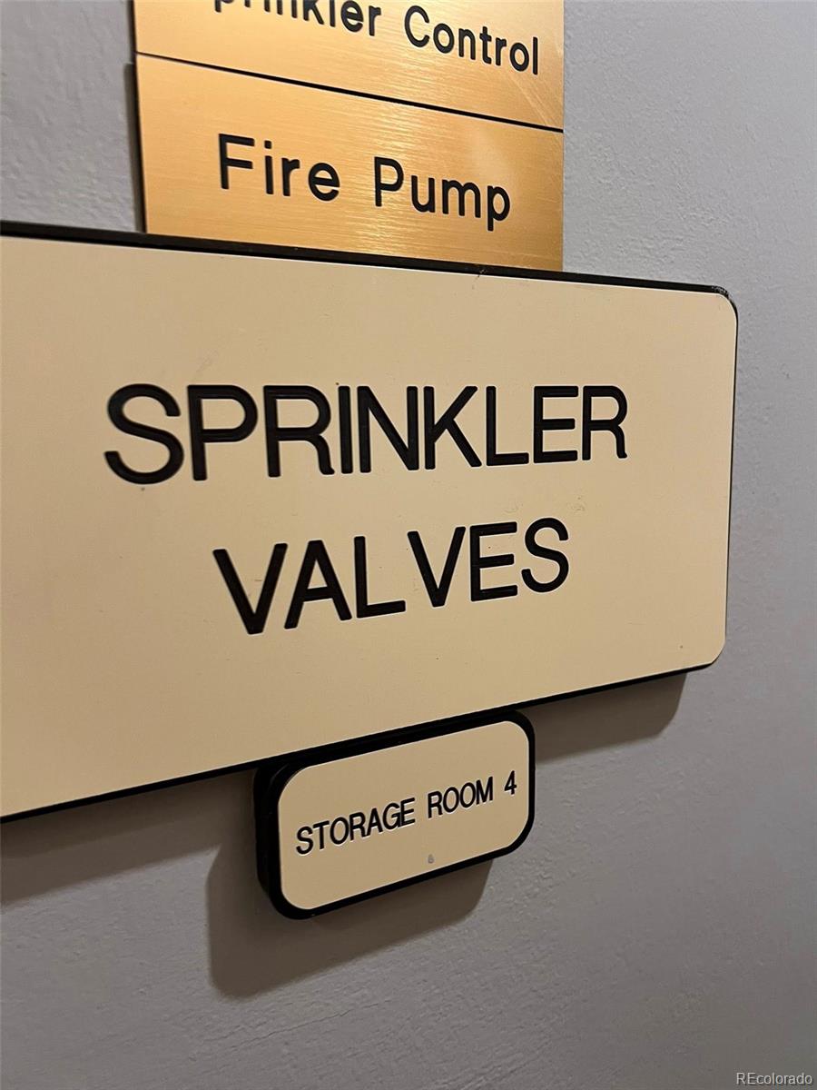 2 Adams Street, Unit 604 Denver, CO 80206 - Photo 35 of 41 a close up of a street sign