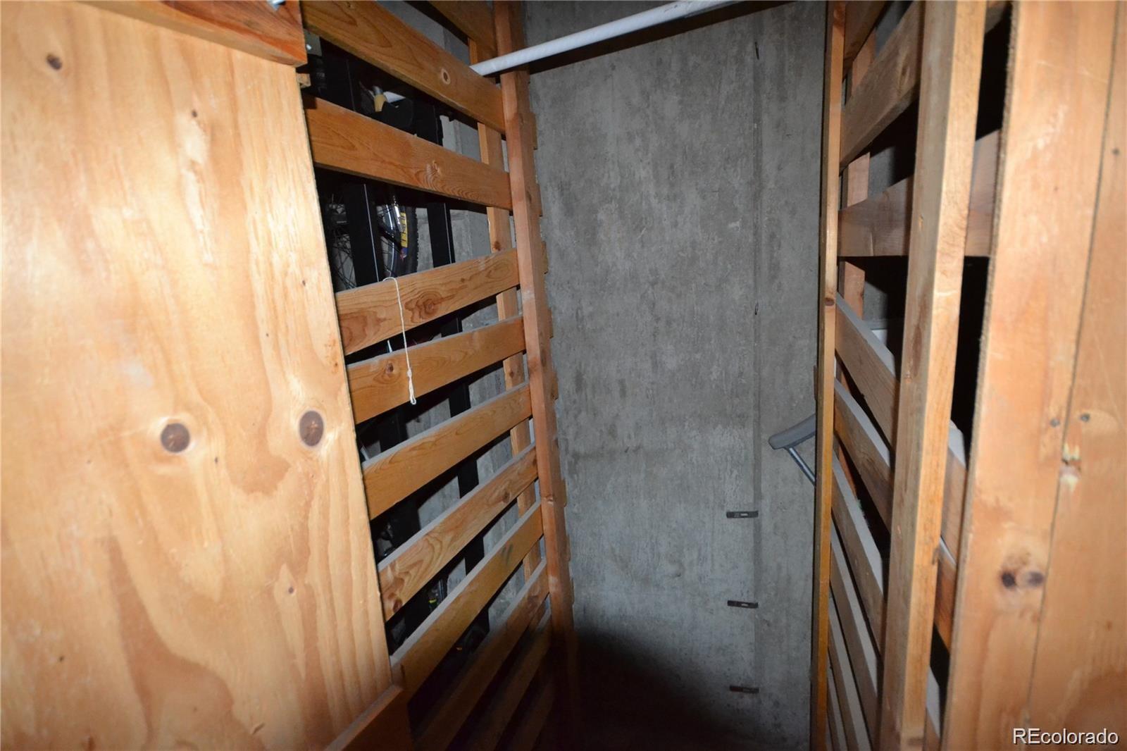 2 Adams Street, Unit 604 Denver, CO 80206 - Photo 36 of 41 a view of staircase with wooden floor and entryway