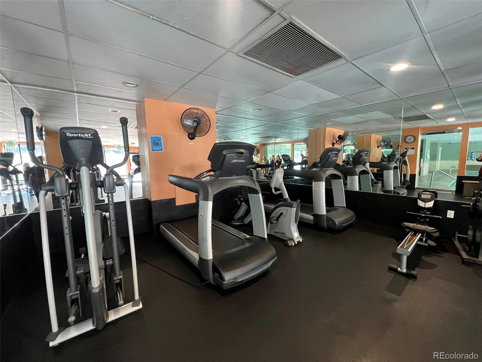 2 Adams Street, Unit 604 Denver, CO 80206 - Photo 39 of 41 a view of a room with gym equipment