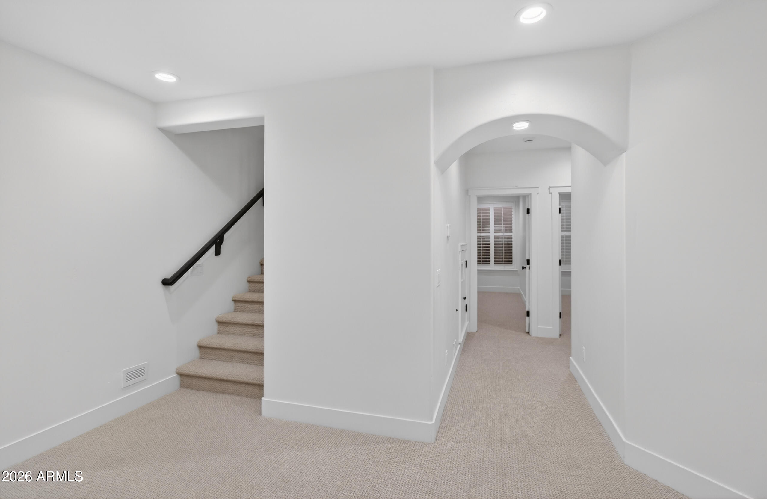 2677 East Queen Creek Road Gilbert, AZ 85297 - Photo 62 of 128 a view of a hallway with a room and a livingroom