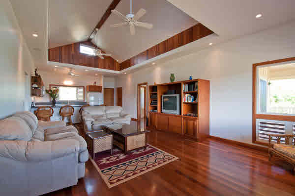 7501 Koolau Road Kilauea, HI 96754 - Photo 3 of 20 a living room with furniture and wooden floor