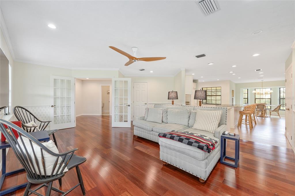 8778 Northwest 130th Street Reddick, FL 32686 - Photo 15 of 88 a living room with furniture and a wooden floor