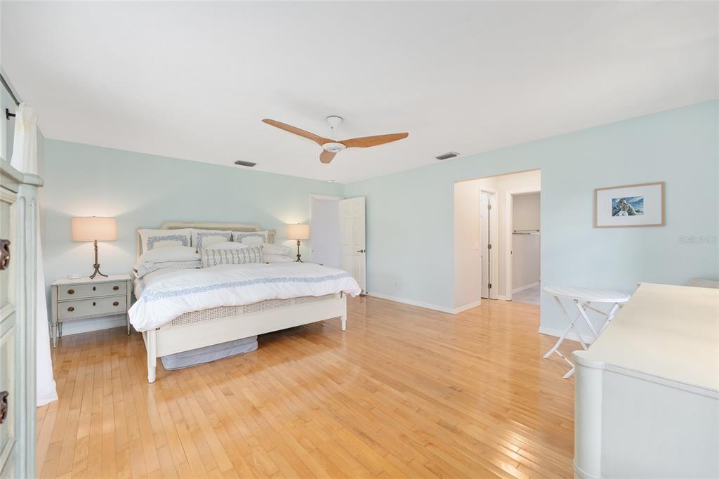 8778 Northwest 130th Street Reddick, FL 32686 - Photo 24 of 88 a bedroom with a bed and a refrigerator