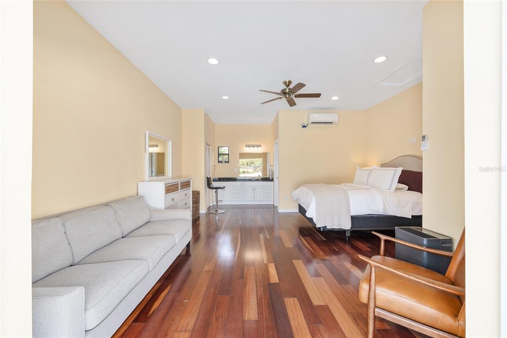 8778 Northwest 130th Street Reddick, FL 32686 - Photo 41 of 88 a living room with furniture and wooden floor