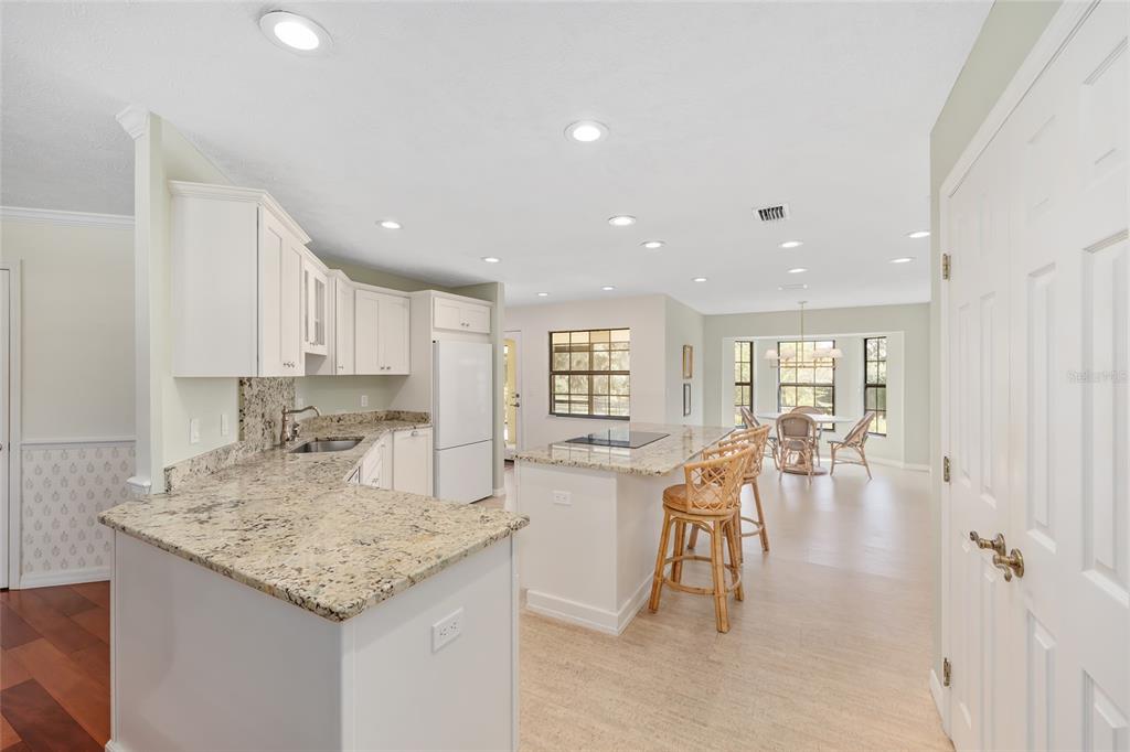 8778 Northwest 130th Street Reddick, FL 32686 - Photo 10 of 88 a kitchen with a table and chairs in it