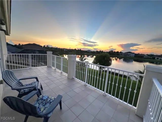 a view of a chairs and table on the deck